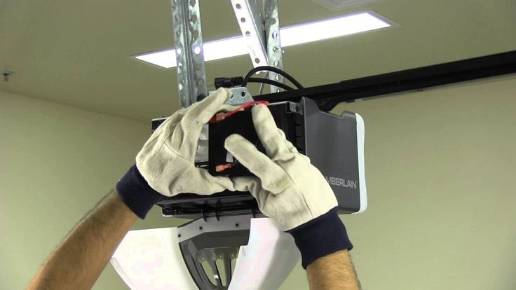 Garage door opener installation by technician