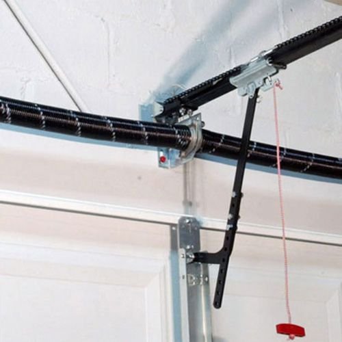 Garage door opener system mounted to the ceiling